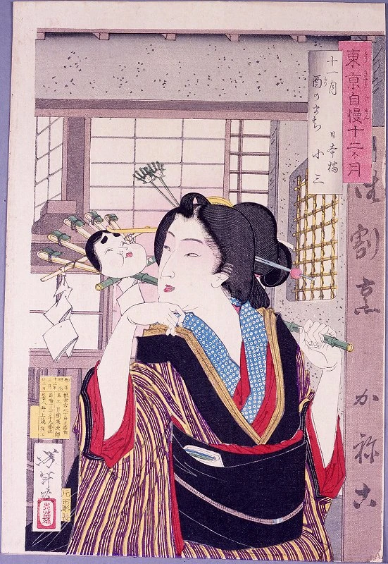 Osan of Nihombashi with toy rakes from the Bird Festival.