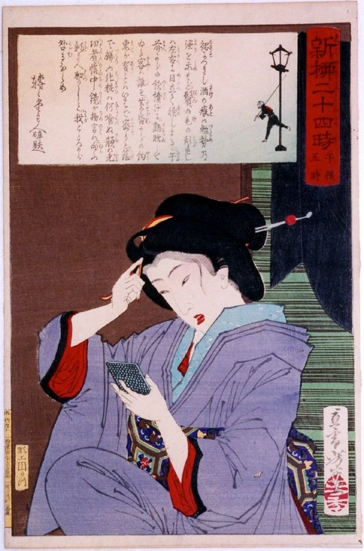 5 p.m - Geisha with hand mirror adjusting hair.